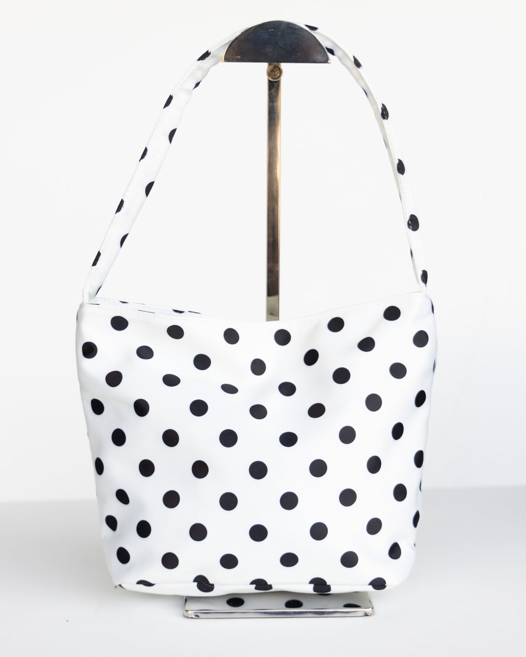 spotted hand bag