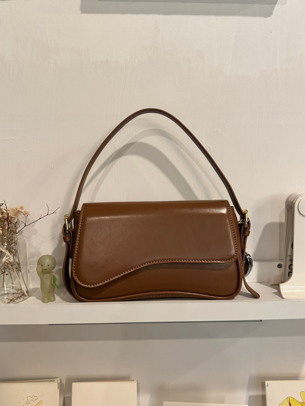 curve shoulder bag